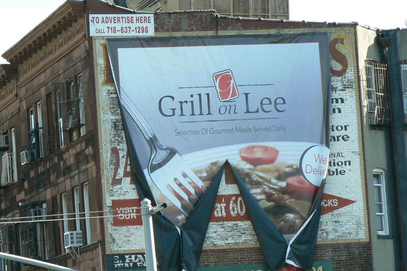 slashed hasidic restaurant sign in williamsburg