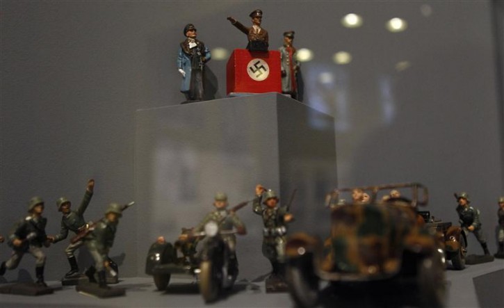 GERMANY-HITLER/ Figures showing dictator Adolf Hitler and German Nazi soldiers are pictured at the media preview of the exhibition "Hilter und die Deutsche Volksgemeinschaft und Verbrechen" (Hitler and the German Nation and Crime) at the Deutsche Historisches Museum (German Historical Museum) in Berlin October 13, 2010. The exhibition will open to the public on October 15 and run till February 6, 2011. REUTERS/Fabrizio Bensch