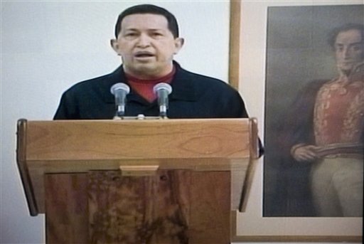 Venezuela Chavez In this frame grab taken from Venezolana de Television, VTV, Venezuela's President Hugo Chavez delivers a televised speech aired from Cuba, Thursday, June 30, 2011. Chavez said he underwent a second surgery in Cuba that removed a cancerous tumor. It was unclear when and where the message was recorded. At right, a painting depicting Venezuela's Independence hero Simon Bolivar. (AP Photo/Ariana Cubillos)