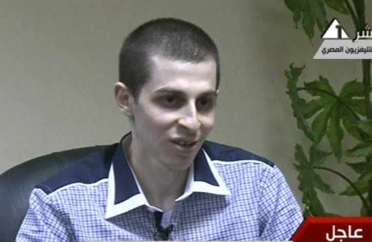 Egypt Israel Palestinians In this image from Egypt TV Tuesday Oct 18 2011 Israeli soldier Gilad Schalit is seen at an undisclosed location, during a pre-recorded interview released Tuesday. Schalit was moved in to Egypt from captivity in Gaza beginning an elaborate prisoner swap deal in which hundreds of Palestinian inmates are to be freed in return for the captured tank crewman. (AP Photo/ Egypt TV)