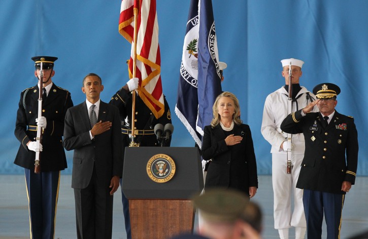 US President Barack Obama (2-L) and Secretary of State Hillary Clinton (3-R) take part in the Transfer of Remains Ceremony marking the return to the United States of the remains of the four Americans killed this week in Benghazi, Libya, at Joint Base Andrews in Washington DC, USA, 14 September 2012. Gunmen attacked the US consulate in Benghazi, killing of US ambassador to Libya, Christopher Stevens, and three embassy staffs.  EPA/MOLLY RILEY / POOL