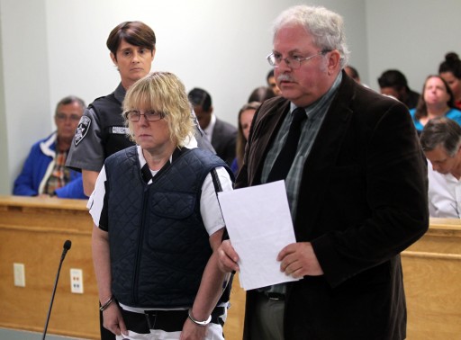 Joyce Mitchell (L) stands with her lawyer Steven Johnston as she appears before Judge Buck Rogers in Plattsburgh City Court, Plattsburgh, New York June 15, 2015. REUTERS/G.N. Miller/NY Post/Pool