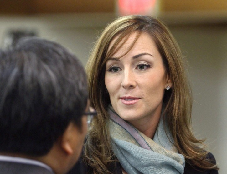 In this photo taken on Feb. 21, 2010, Amanda Lindhout attends a reception held in her honor by the Alberta Somali-Canadian community in Calgary, Alberta. Canadian police have arrested a Somali man for his role in the kidnapping of Lindhout and another foreign journalist who were held in Somalia for more than 15 months before being freed nearly seven years ago. Larry MacDougal/The Canadian Press via AP) 