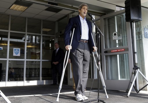 Secretary of State John Kerry speaks to media as he is discharged from Massachusetts General Hospital Friday, June 12, 2015, in Boston. Kerry was released from the hospital after undergoing surgery on a broken leg sustained in a May 31 bicycle accident in France. (AP Photo/Elise Amendola)
