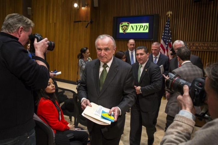 FILE - New York City Police Commissioner William Bill Bratton departs with Diego Rodriguez, Assistant Director in Charge of the New York division for the FBI, at One Police Plaza in New York February 25, 2015.