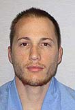 Justin Kestner is seen in an undated photo provided by the Iowa Department of Corrections. Kestner, a 25-year-old inmate who escaped from the Iowa State Penitentiary Sunday morning, July 5, 2015, has been recaptured in Illinois. The Iowa Corrections Department says Justin Kestner was arrested later on Sunday morning by the Illinois State Police just south of Geneseo, Illinois. (Iowa Department of Corrections via AP)
