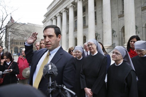 Lead cousel Mark Rienzi, representing Little Sisters of the Poor, speaks to members of the media after attending a hearing in the 10th U.S. Circuit Court of Appeals, in Denver, Colo., Monday, Dec. 8, 2014. (AP Photo/Brennan Linsley)