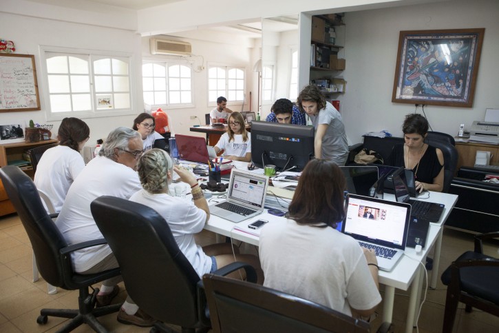 Members of the Yala Young Leaders group, an Internet-based peace movement of Middle Eastern and North African youth, sit at the group's headquarters in Tel Aviv, Israel, Thursday, July 2, 2015.(AP Photo/Dan Balilty)