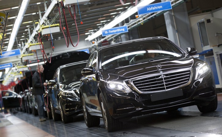 FILE - In this Jan. 28, 2015 file photo, a Mercedes-Benz AG employee checks a S-Class model at the plant in Sindelfingen, Germany. Traditional automakers like Mercedes and Toyota already make vehicles with the building blocks of self-driving _ systems that rely on cameras and radar to keep cars within their lanes, apply the brakes or park by themselves. Their plan is to gradually automate more functions of driving until, perhaps by 2025, some cars will be fully capable of driving themselves. (AP Photo/Matthias Schrader, File)