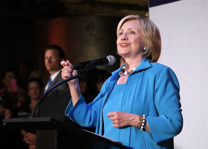 Democratic presidential candidate Hillary Rodham Clinton speaks to supporters during a campaign rally at La Rumba, a Denver dance club and restaurant, Tuesday, Aug. 4, 2015. (AP Photo/Brennan Linsley)