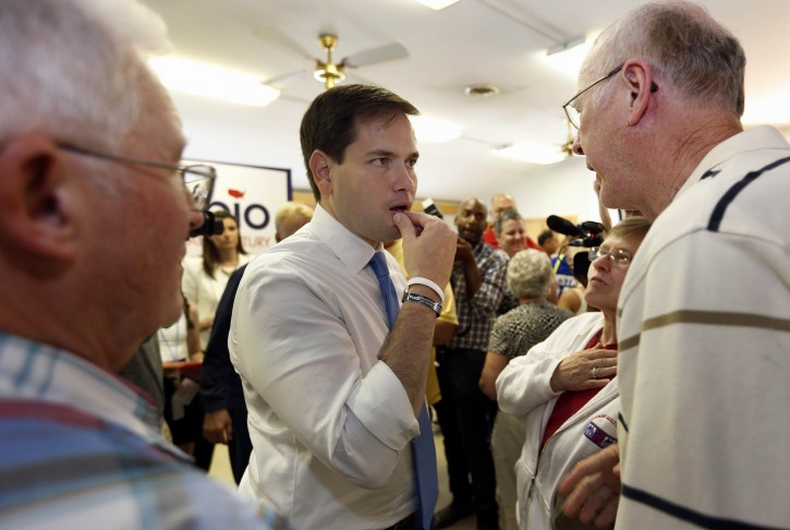 Republican presidential candidate, Sen. Marco Rubio, R-Fla., talks with voters during a campaign stop at the VFW, Wednesday, Aug. 26, 2015, in Littleton, N.H. (AP Photo/Jim Cole)