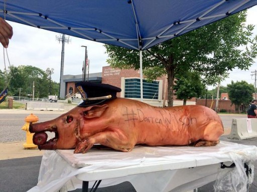 Missouri – Pig’s Head Used In Ferguson Anniversary Protest