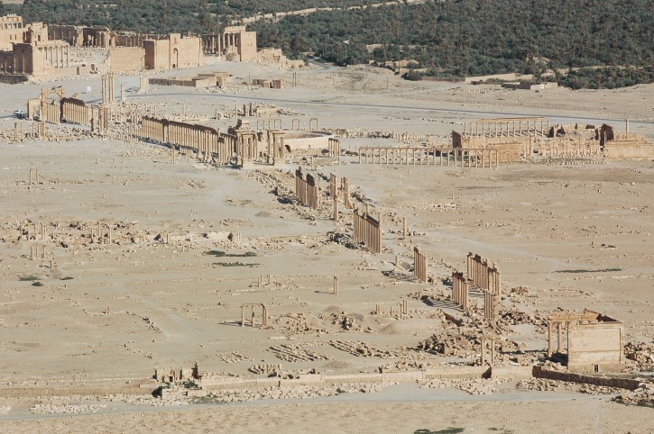 This undated image released by UNESCO shows the site of the ancient city of Palmyra, Syria.  A satellite image on Monday, Aug. 31, 2015 shows that the main building of the ancient Temple of Bel in the Syrian city of Palmyra has been destroyed, a United Nations agency said. The image was taken a day after a massive explosion was set off near the 2,000-year-old temple in the city occupied by Islamic State militants. (Ron Van Oers, UNESCO via AP)