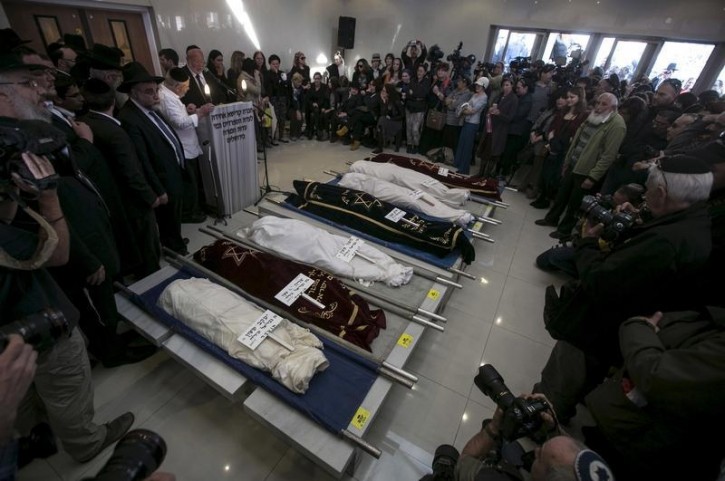 Mourners gather around bodies of seven children before their burial in Jerusalem Mourners gather around the bodies of seven children from the Sassoon family during a funeral service before their burial in Jerusalem March 23, 2015. Reuters