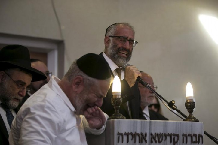 Gabriel Sassoon delivers a eulogy before the burial of his seven children in Jerusalem Gabriel Sassoon delivers a eulogy before the burial of his seven children in Jerusalem March 23, 2015. Reuters