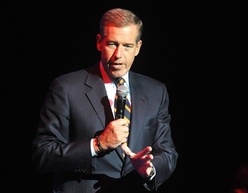 FILE - In this Nov. 5, 2014, file photo, Brian Williams speaks at the 8th Annual Stand Up For Heroes, presented by New York Comedy Festival and The Bob Woodruff Foundation in New York. Williams will return to the air following his suspension on Sept 22, 2015, as part of MSNBCs coverage of Pope Francis visit to the United States. (Photo by Brad Barket/Invision/AP, File)