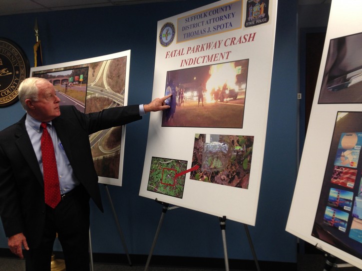 FILE- In this Aug. 27, 2015 file photo, Suffolk County District Attorney Thomas J. Spota points to a photograph of the aftermath of a deadly automobile accident on New Yorks Long Island, during a news conference in Happague, N.Y. In the prosecution of the man charged with the accident, the District Attorneys Office is employing a forensic technique that estimates a persons blood alcohol content at the time of an offense, based on its level at the time it was read. Some experts question the accuracy of the technique known as retrograde extrapolation: labeling it junk science. (AP Photo/Frank Eltman, File)