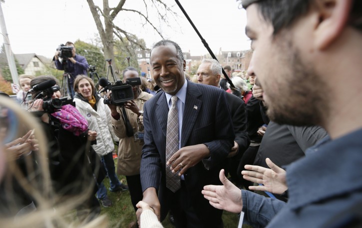 In this Oct. 24, 2015, photo, Republican presidential candidateBen Carson greets audience members after speaking outside the Alpha Gamma Rho fraternity at Iowa State University during a campaign stop in Ames, Iowa. Carson and the other Republican presidential candidates are getting ready for the third GOP debate on Oct. 28, in Boulder, Colo.(AP Photo/Charlie Neibergall)
