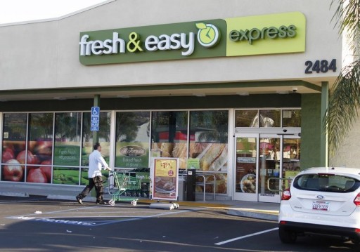 FILE  - A customer pushes a cart to the entrance of a Fresh & Easy Express food market in Burbank, California October 17, 2012. REUTERS