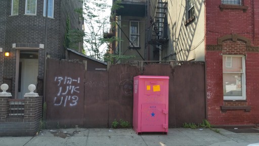 Clothing bin in Brooklyn, NY - (Photo VIN News)