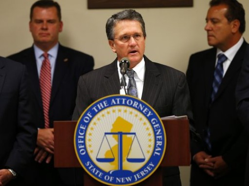 FILE - New Jersey acting Attorney General John J. Hoffman speaks at a news conference in Newark, N.J. on Tuesday, Oct 21, 2014.  (AP Photo/Rich Schultz)