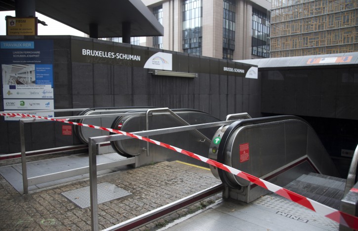 Police tape blocks the entrance of a metro station in Brussels on Saturday, Nov. 21, 2015. Belgium raised its security level to the highest degree on Saturday as the manhunt continues for extremist Salah Abdeslam who took part in the Paris attacks. The security alert shut metro's, shops, and cancelled events with high concentrations of people. (AP Photo/Virginia Mayo)