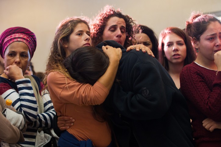. Mourners react during the funeral of Hadar Buchris, 21, in Jerusalem on November 23, 2015. Hadar Buchris was murdered in a stabbing attack at the West Bank's Gush Etzion Junction yesterday. Photo by Mirian Alster/Flash90