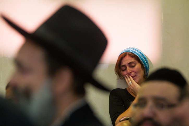 . Mourners react during the funeral of Hadar Buchris, 21, in Jerusalem on November 23, 2015. Hadar Buchris was murdered in a stabbing attack at the West Bank's Gush Etzion Junction yesterday. Photo by Mirian Alster/Flash90