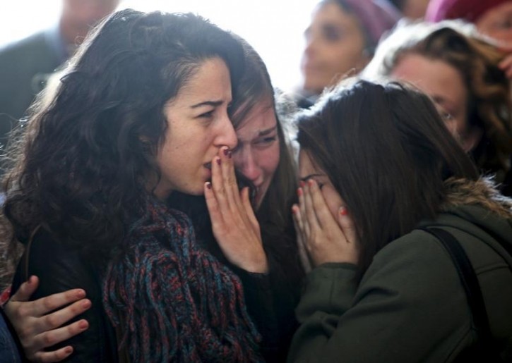 Mourners react during the funeral for Israeli Hadar Buchris in Jerusalem Mourners react during the funeral for Israeli Hadar Buchris, 21, in Jerusalem, November 23, 2015. Reuters