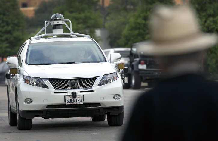 In this 2015 photo, a Google self-driving SUV is viewed in Austin, Texas. Hustling to bring cars that drive themselves to a road near you, Google finds itself somewhere that has frustrated many before: Waiting for help from California's department of motor vehicles. Over the summer, Google expanded its road testing from Silicon Valley to Texas, where state law would not prohibit cars without pedals and a wheel. (Ralph Barrera/Austin American-Statesman via AP) 