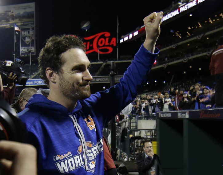 New York Mets' Daniel Murphy waves to fans after Game 5 of the Major League Baseball World Series against the Kansas City Royals Monday, Nov. 2, 2015, in New York. The Royals won 7-2 to win the series. (AP Photo/Matt Slocum)