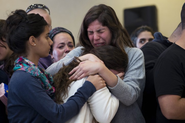 Stabbing attack victim funeral in Jerusalem Family members and relatives of Israeli Hadar Buchris mourn during her funeral ceremony in Jerusalem, Israel, 23 November 2015. Hadar Buchris, 21, was killed by a Palestinian attacker who stabbed her to death at the central bus station in the Gush Etzion settlement block junction in the West Bank on 22 November. EPA/ABIR SULTAN