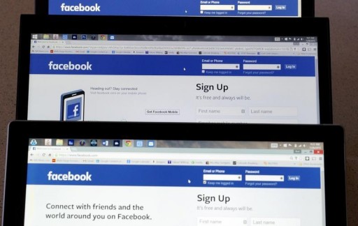 FILE - Computer screens display the Facebook sign-in screen in this photo illustration taken in Golden, Colorado July 28, 2015.REUTERS