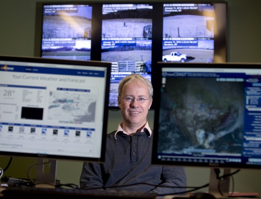 In this Monday, Jan. 11, 2016 photo, Professor Chris Thorncroft, chairman of the Atmospheric and Environmental Sciences Department at the University at Albany and co- principal investigator for the New York State Mesonet, poses in the Mesonet operations center at the university in Albany, N.Y. Described as the new gold standard of automated systems, the long-planned network of 125 weather stations stretching from the shores of Lake Erie to the tip of Long Island is expected to be completed by the end of the year. Thorncroft is helping lead the development of the New York State Mesonet, which is being funded with a $23.6 million grant from the Federal Emergency Management Agency. (AP Photo/Mike Groll)