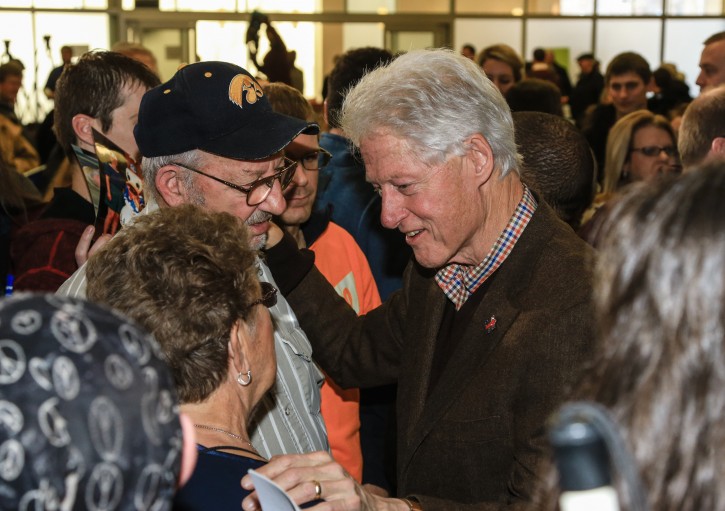 Former President Bill Clinton meets with members of his audience after speaking at a campaign event for his wife, Democratic presidential candidate Hillary Clinton,  Friday, Jan. 15, 2016, at Morningside College in Sioux City, Iowa. (AP Photo/Nati Harnik)