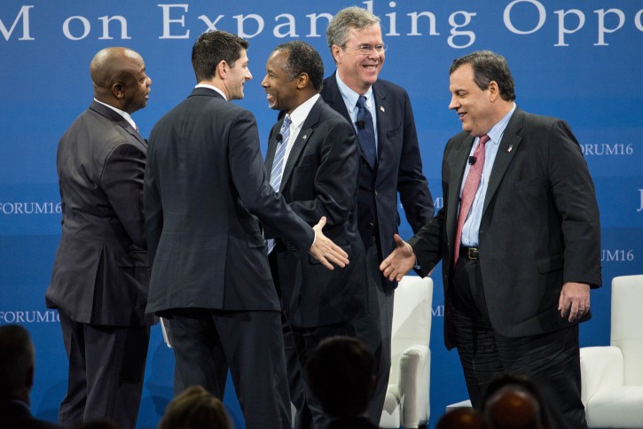FILE - In a Saturday, Jan. 9, 2016 file photo, New Jersey Gov. Chris Christie, right, shake hands with Republican presidential candidates Ben Carson, center, Jeb Bush and Sen. Tim Scott, R-S.C., left, and House Speaker Paul Ryan of Wis. at the Kemp Forum, in Columbia, S.C. (AP Photo/Sean Rayford, File)