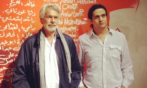 Ashraf Fayadh, right, with art historian Chris Dercon, outgoing director of Tate Modern, attend the opening of an exhibition in Jeddah curated by Ashraf Fayadh. Photograph: Ashraff Ayadh/Instagram