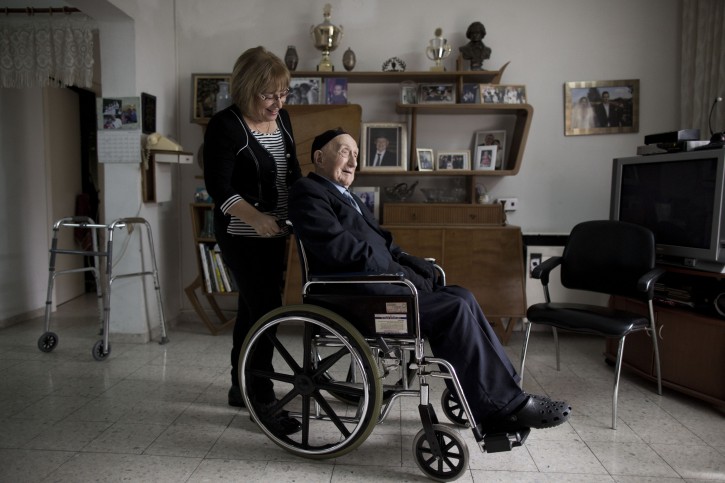 A file picture dated 27 January 2015 shows Holocaust survivor Israel (Yisrael) Krystal (in wheelchair) and is daughter Shula at his home in the city of Haifa, Israel. According to a report by Israeli newspaper Haaretz on 20 January 2016, Krystal could be the oldest living man, if he was able to prove his age of 112 years. EPA