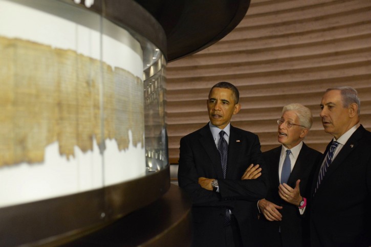 FILE - U.S. President Barack Obama (L) and Israeli Prime Minister Benjamin Netanyahu (R) listen to as Director of the Israel Museum James S. Snyder explains about the Dead Sea Scrolls, during their visit at the Shrine of the Book, at the Israel Museum in Jerusalem on March 21, 2013. Flash90