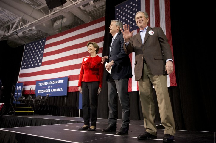 Republican presidential candidate and former Florida Gov. Jeb Bush, accompanied by his brother former President George W. Bush and George's wife Laura Bush, takes the stage during a campaign stop Monday, Feb. 15, 2016, in North Charleston, S.C. (AP Photo/Matt Rourke)