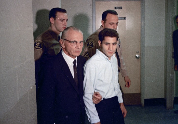 FILE - This June 1968 file photo shows Sirhan Sirhan, right, accused assassin of Sen. Robert F. Kennedy with his attorney Russell E. Parsons in Los Angeles. For nearly 50 years, Sirhan Sirhan has been consistent: He says he doesn't remember fatally shooting Sen. (AP Photo/File)