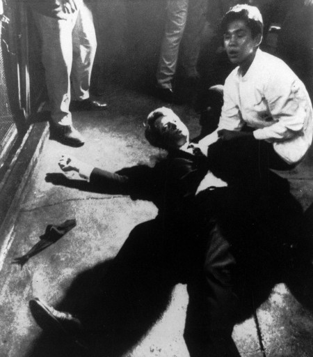 FILE - In this June 5, 1968 file photo, Sen. Robert F. Kennedy awaits medical assistance as he lies on the floor of the Ambassador hotel in Los Angeles moments after he was shot. Sirhan Sirhan, who is serving a life sentence for the assassination of Sen. Kennedy, seeks freedom at his 15th parole hearing on Wednesday, Feb. 10, 2016. During his last parole hearing in 2011, Sirhan told officials of his regret but also said he could not remember the events of June 5, 1968. (Boris Yaro/Los Angeles Times via AP, File)