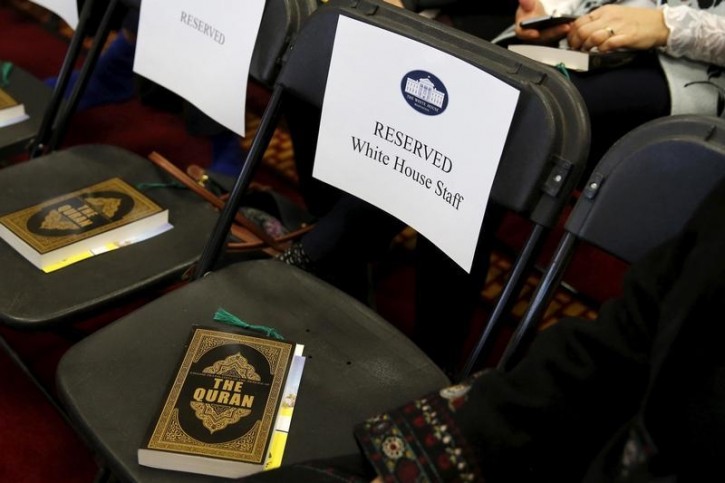 Copies of the Koran sit on chairs, including those reserved for White House staff members, in a room prepared for remarks by U.S. President Barack Obama at the Islamic Society of Baltimore mosque in Catonsville, Maryland February 3, 2016.  REUTERS/Jonathan Ernst 