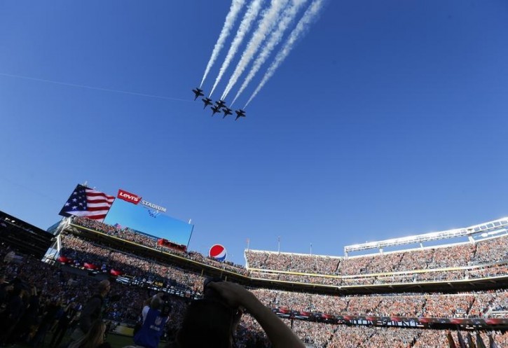 The U.S. Navy Blue Angels demonstration team perform a flight over Levi Stadium before the start of the NFL's Super Bowl 50 football game between the Carolina Panthers and the Denver Broncos in Santa Clara, California February 7, 2016.   REUTERS/Mike Blake