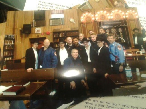 FILE February 2002 - Firemen from Ladder 113 visiting Yeshiva Oholei Torah after the fire. From left to right brothers are Mendel, Zalman, Shmulik Friedman. Lieutenant Scaramuzzino is not in that picture.)