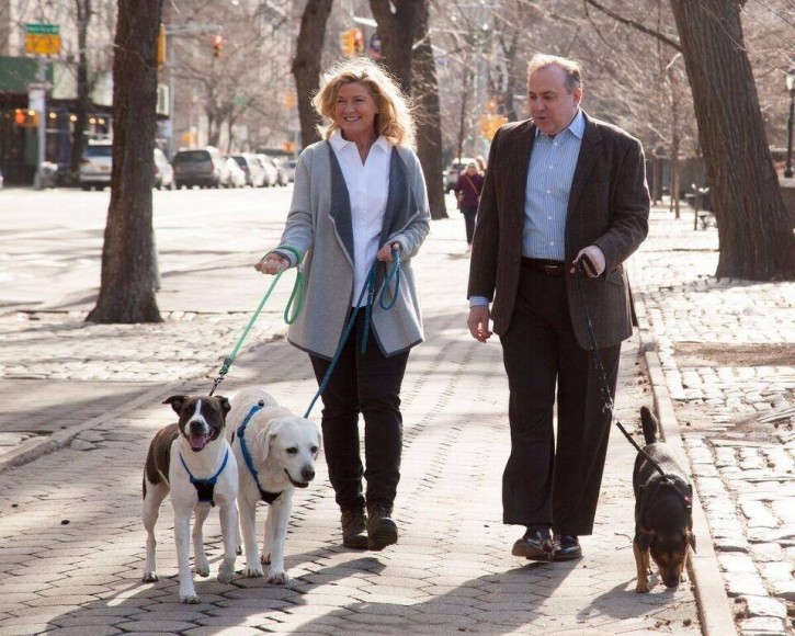Wendy and her husband Arthur out on a stroll in New York City with their three dogs