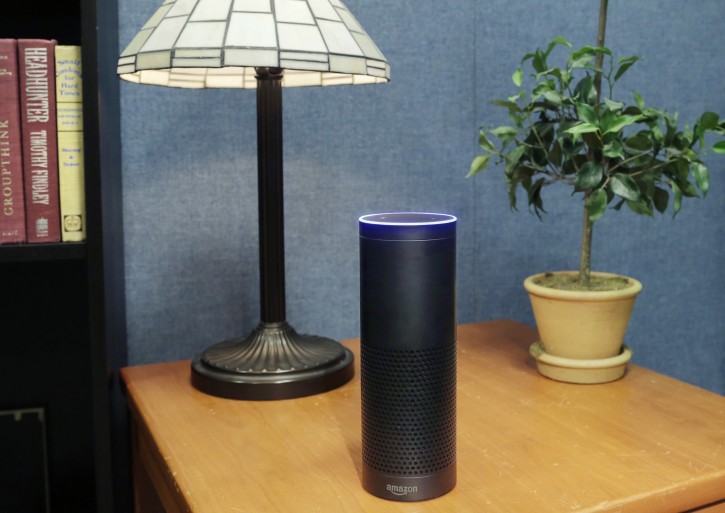 FILE - This July 29, 2015, file photo made in New York shows Amazon's Echo, a digital assistant that continually listens for commands such as for a song, a sports score or the weather. Starting Thursday, March 17, 2016, Amazonâs voice assistant will tell you how well you slept and how much more exercise you need, at least if you have a Fitbit fitness tracker and an Alexa-compatible device, such as Amazonâs Echo speaker and Fire TV streaming devices. (AP Photo/Mark Lennihan, File)