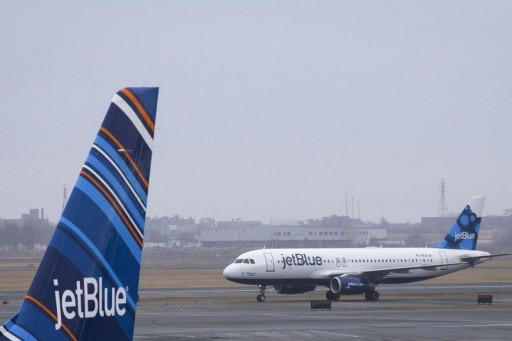 FILE - An A320 Jet Blue plane taxis at JFK airport in New York, March 28, 2014.  REUTERS/Brendan McDermid 