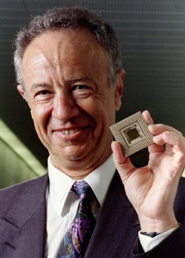 FILE - Intel Corp. President and CEO Andy Grove shows off the company's Pentium microprocessor, March 22, 1993. Reuters