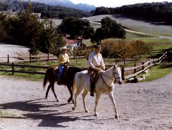 FILE - Ronald and Nancy Reagan ride horses on their Santa Barbara Ranch, known as Rancho del Cielo, in this file photo taken during Reagan's presidency.